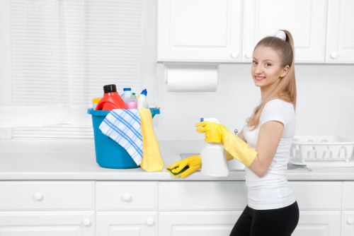 Professional carpet cleaning technician inspecting a room for safety risks